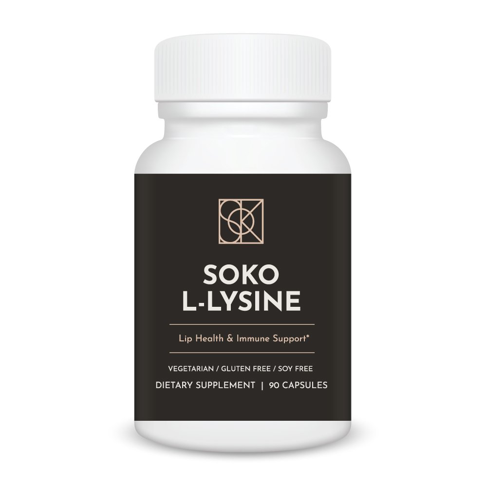 Soko L-Lysine supplement bottle on wooden table with natural light, premium 500 mg L-Lysine capsules for collagen support, immune health, muscle repair and calcium absorption