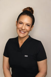 Ashley Williams, RN Nurse Injector head shot at SOKO Aesthetics in Leawood KS